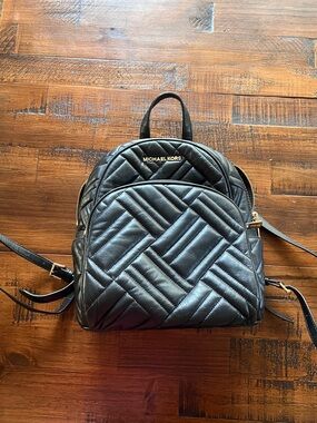 Michael Kors Black Quilted Chevron Backpack with Gold Hardware